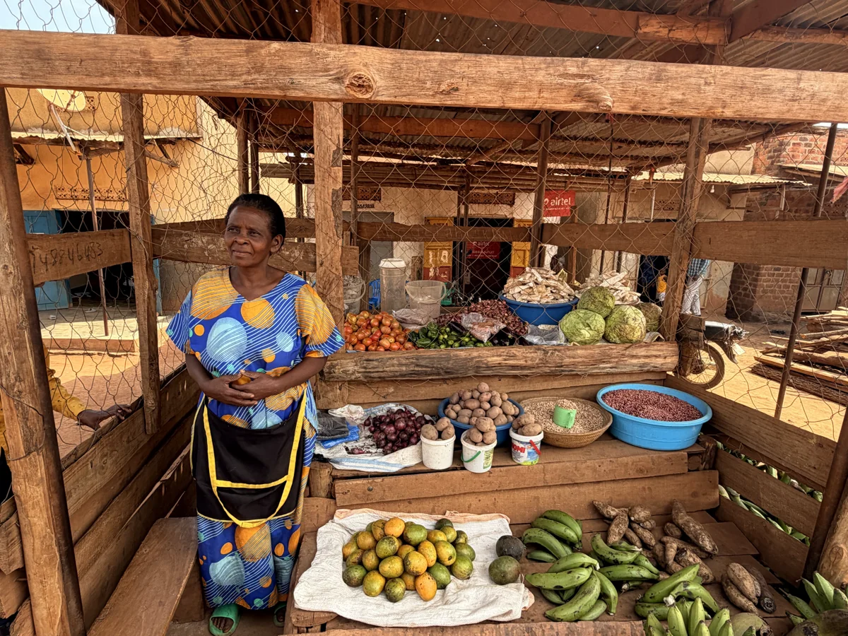 Pastor Kefezza at her produce stall, January 2026. She joined the partnership program in 2025.