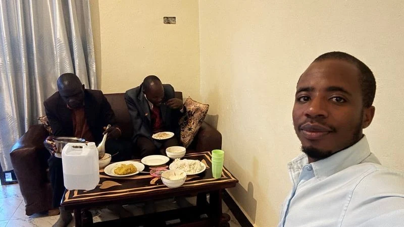The team sharing a meal after the March 29 visits.