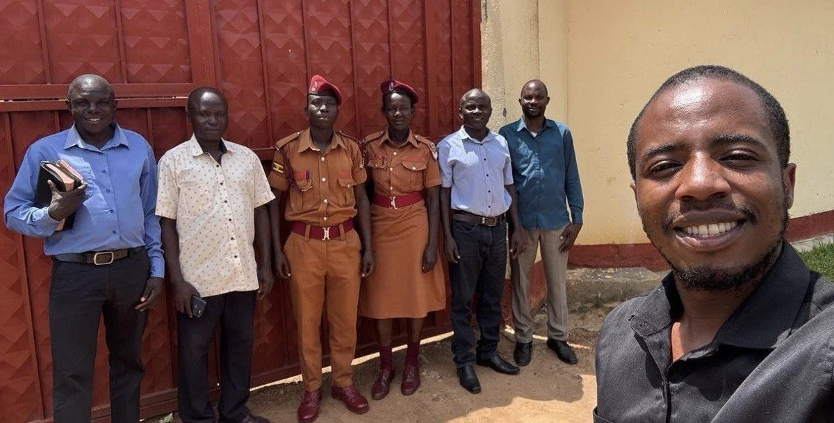 Naphtali with the visiting team and prison staff at Kasanda, April 4, 2026.