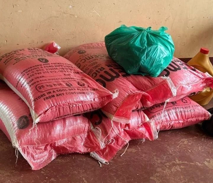 Sacks and food supplies arranged for the planned meal.