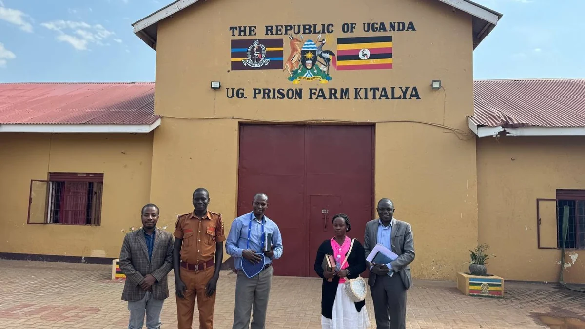 The visiting team with prison staff at Kitalya, June 28, 2026.