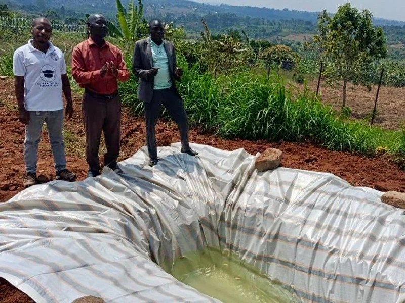 The PSM team beside the prepared baptism pool at Mwera, July 26, 2026.