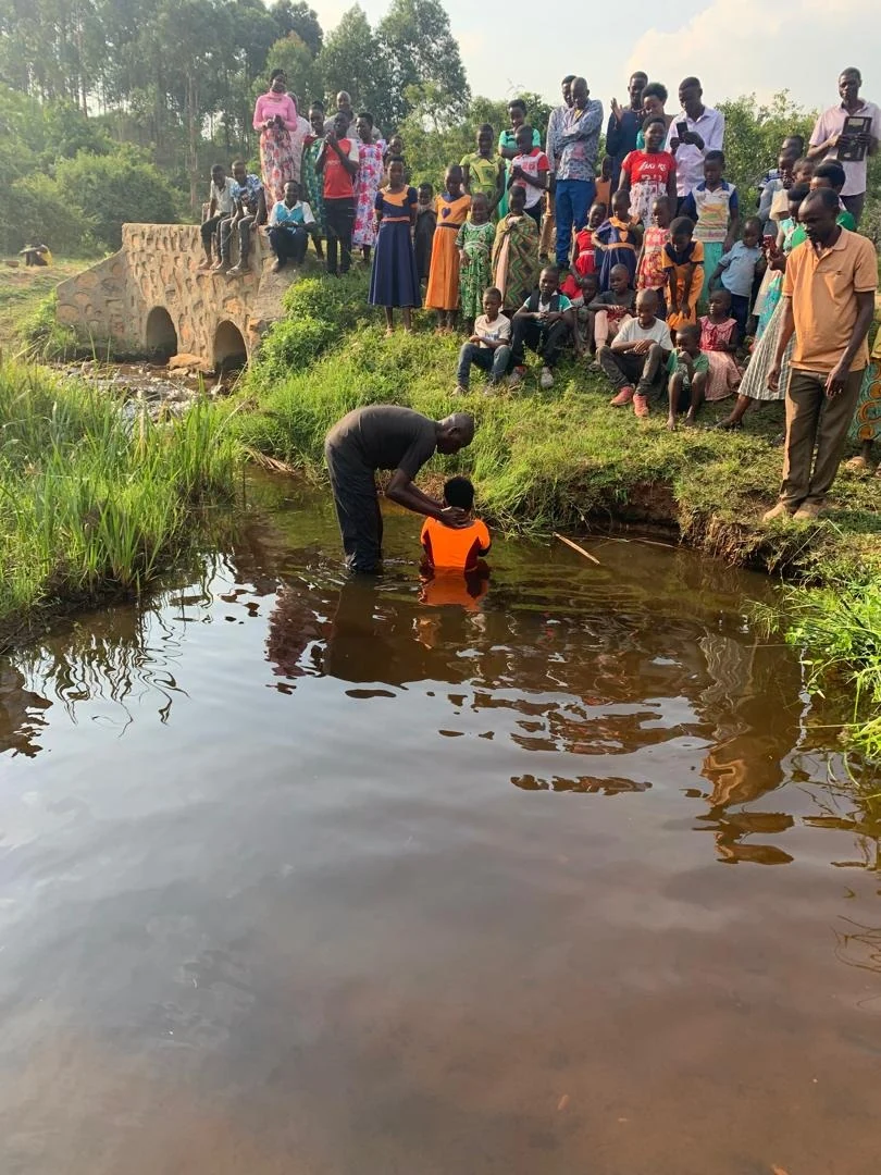 Baptism during the Kyampitsi outreach, pictured in the August 2025 update.