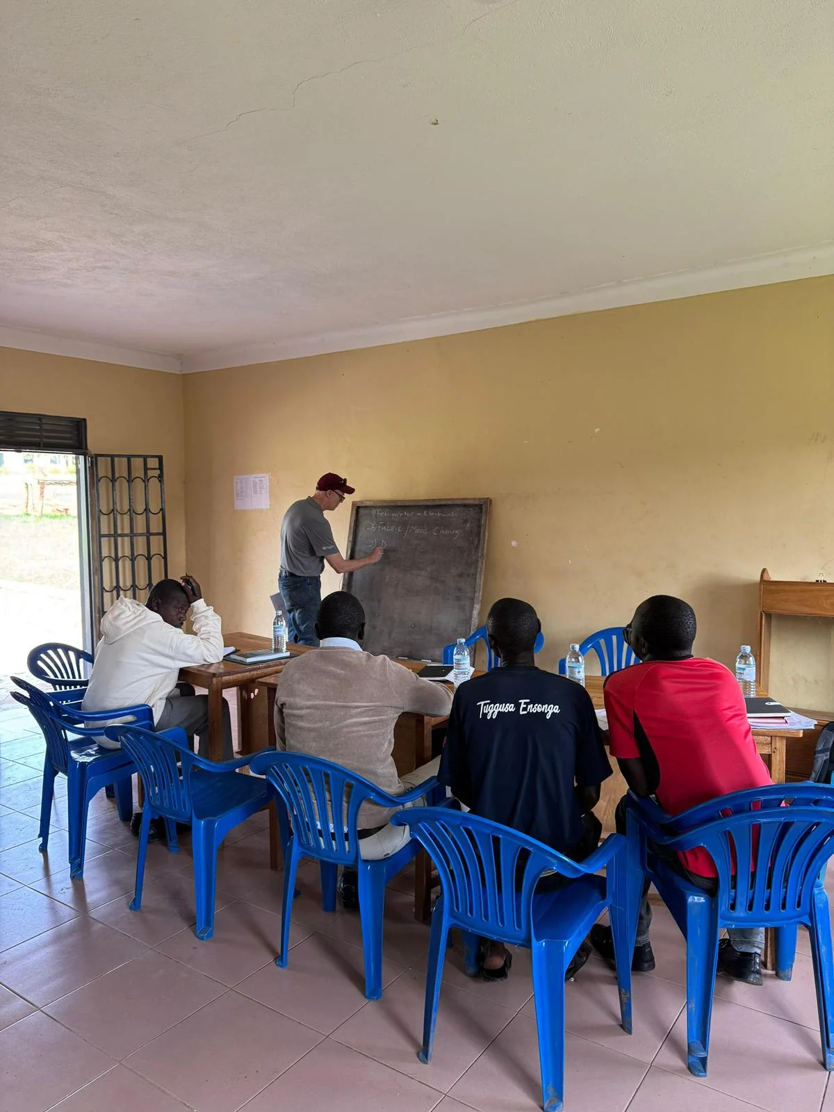 Business-training photograph from the trip presentation.