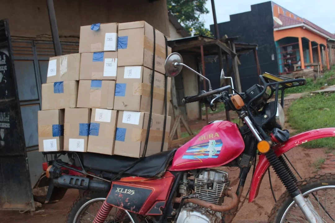 New Testaments ready for delivery by boda-boda.