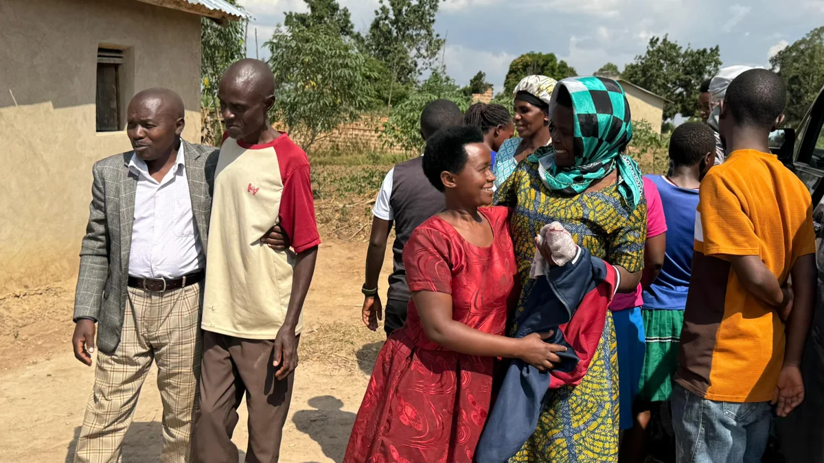 Church members welcoming the visiting ministry team at Kabuga.