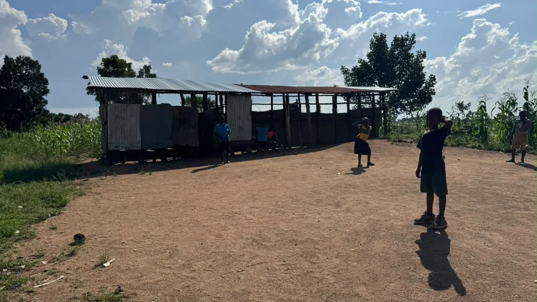 Children outside the school building shared with Pastor Joseph’s testimony.